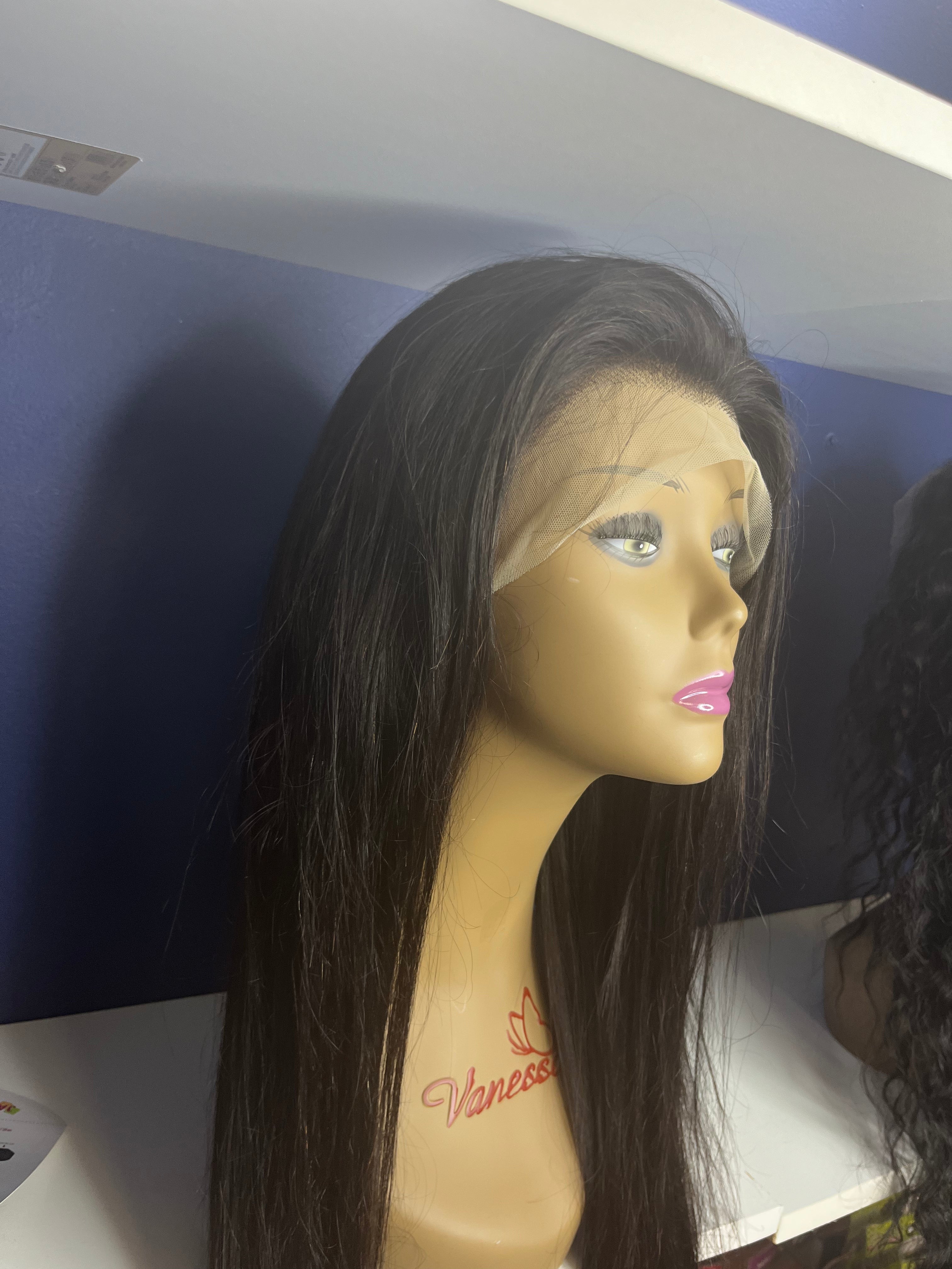 Glueless 13 by 4 Frontal Bone Straight Lacewig on Mannequin sitting on white shelf in blue background