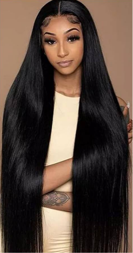 Beautiful  woman wearing  long bone straight virgin hair bundles in the lengths 20"22" and 24 inches